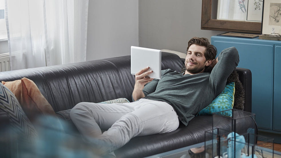 TV streaming; man with tablet